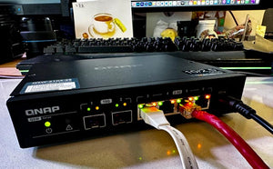QNAP QSW-2104-2S Network Hubs x Giesemann OCXO Edition